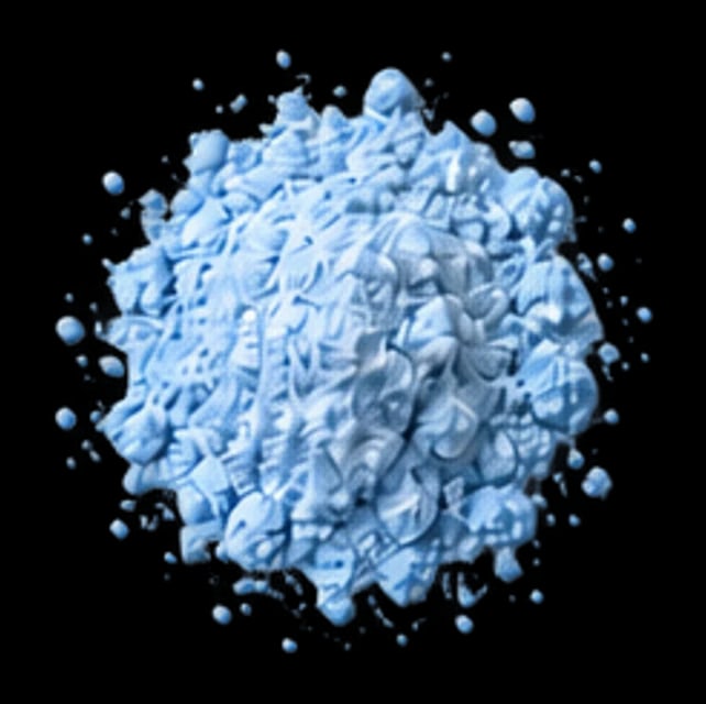 A pinch of pale blue copper chelate powder