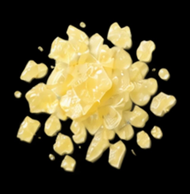 Pale yellow flakes of vitamin K2