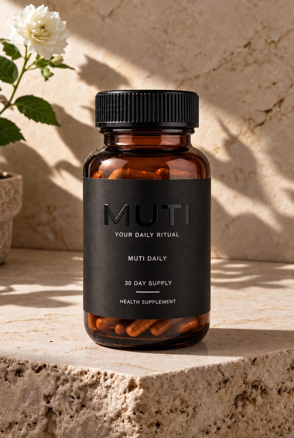 MUTI DAILY on a sunlit stone ledge